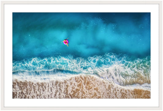 Pink Innertube in the Ocean